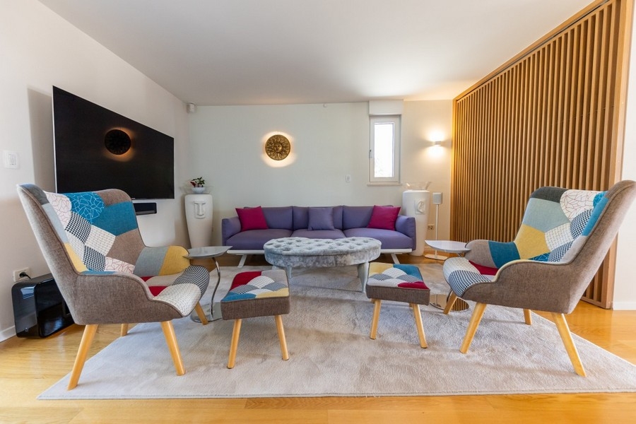 Cozy lounge area with designer armchairs