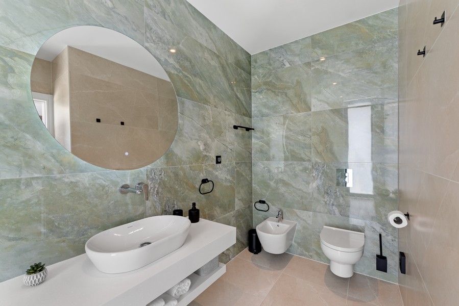 Sauna with wooden paneling and loungers in the villa near Porec, Istria