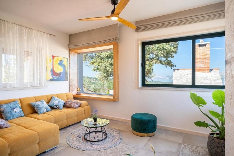 Living room with sea views and large windows