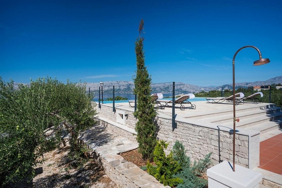 Terrace with infinity pool and panoramic views of the sea and coast