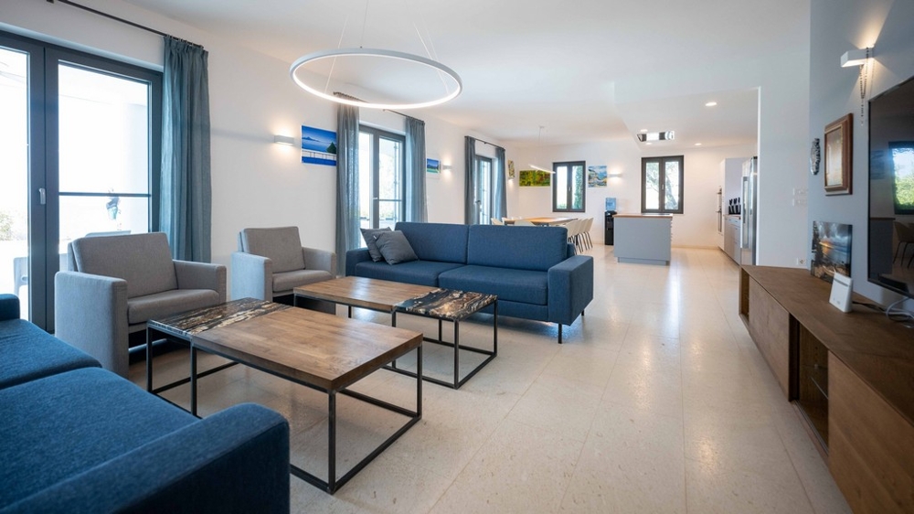 Bright living area with large windows and open room design