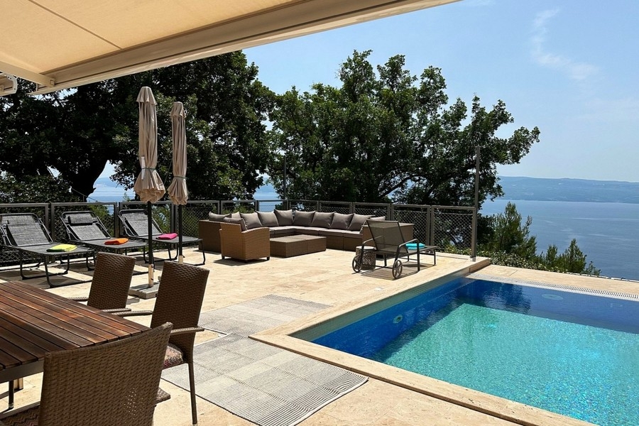 Terrace with swimming pool and sea views