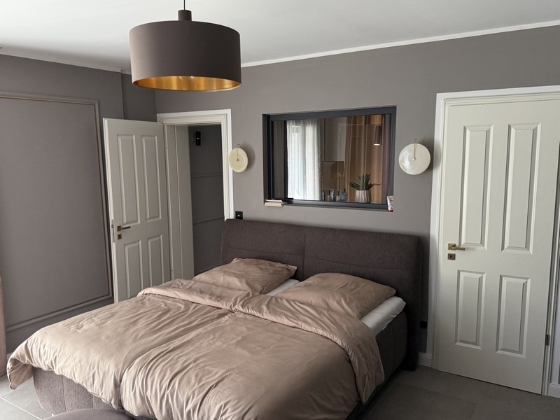 Bedroom with double bed and built-in wardrobe