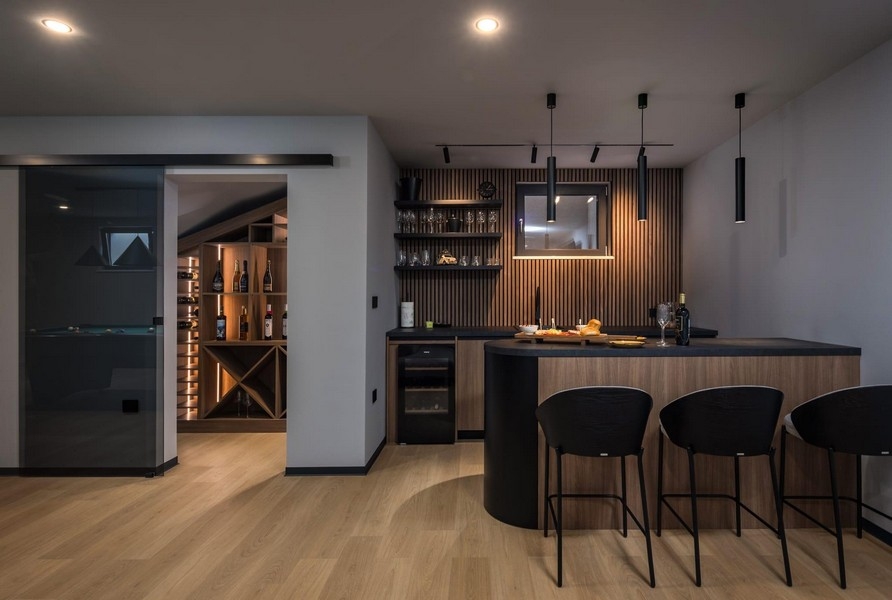 Home bar with wine cooler and modern design