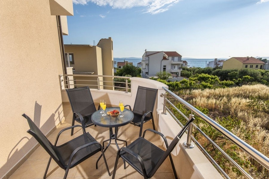 Balcony with sea view and seating area