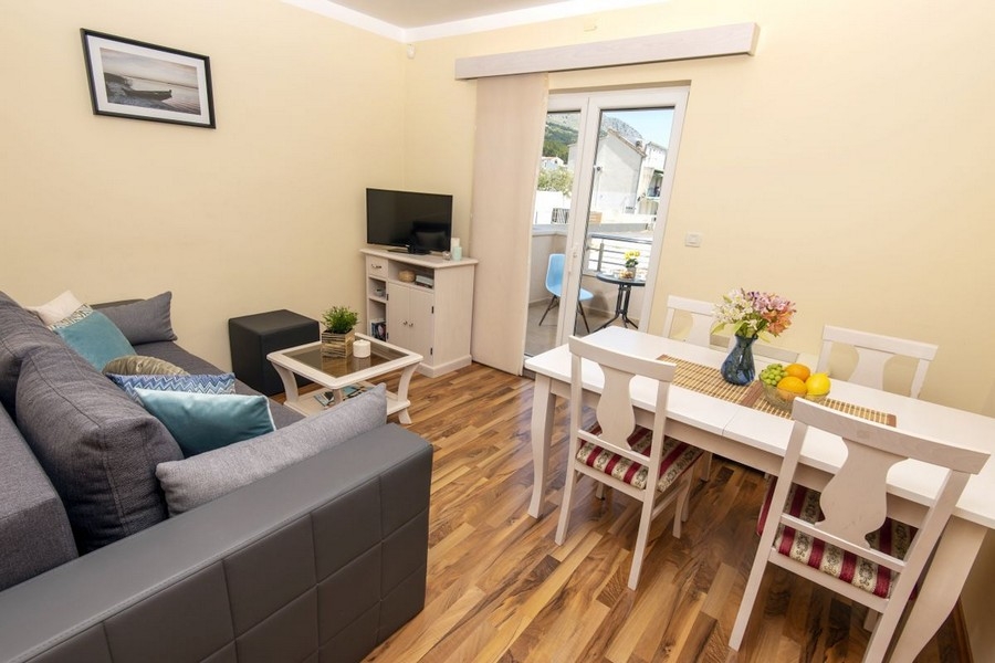 Living room with sofa and dining area