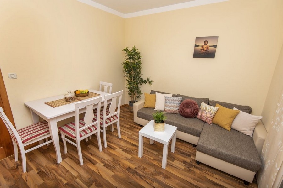 Living room with seating area and table