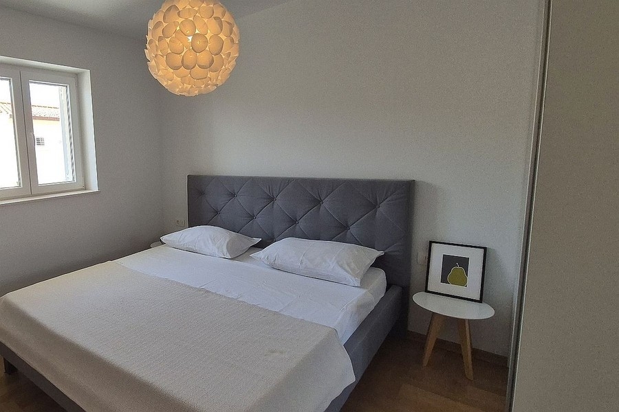 Bedroom with double bed and window