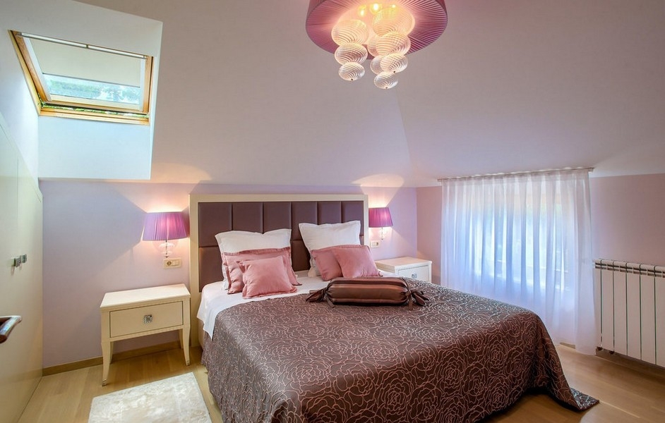 Bedroom with double bed and bright furnishings