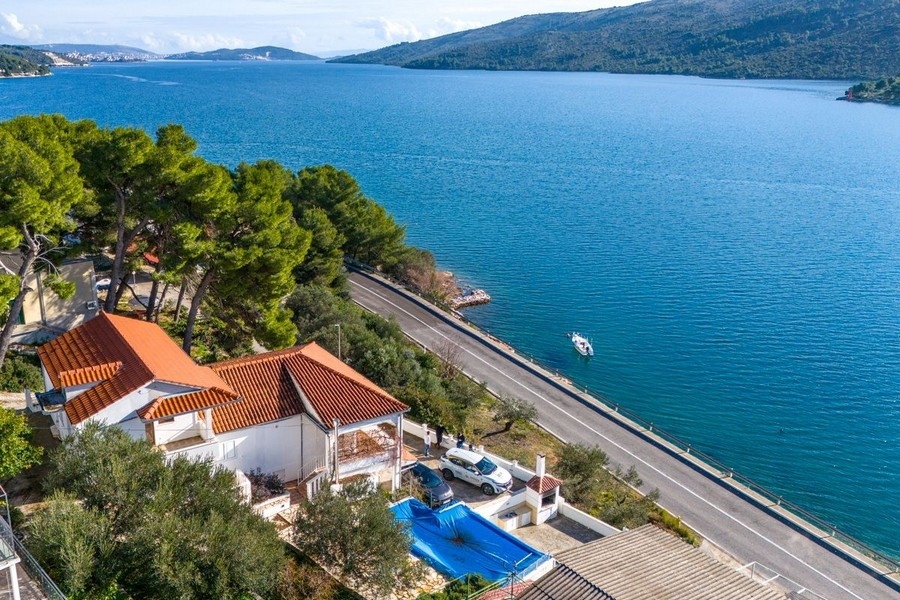 Buy a house by the sea near Trogir in Croatia.