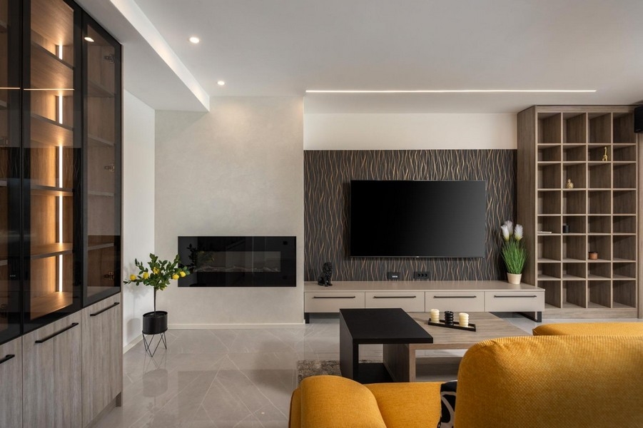 Modern living area with TV wall and fireplace