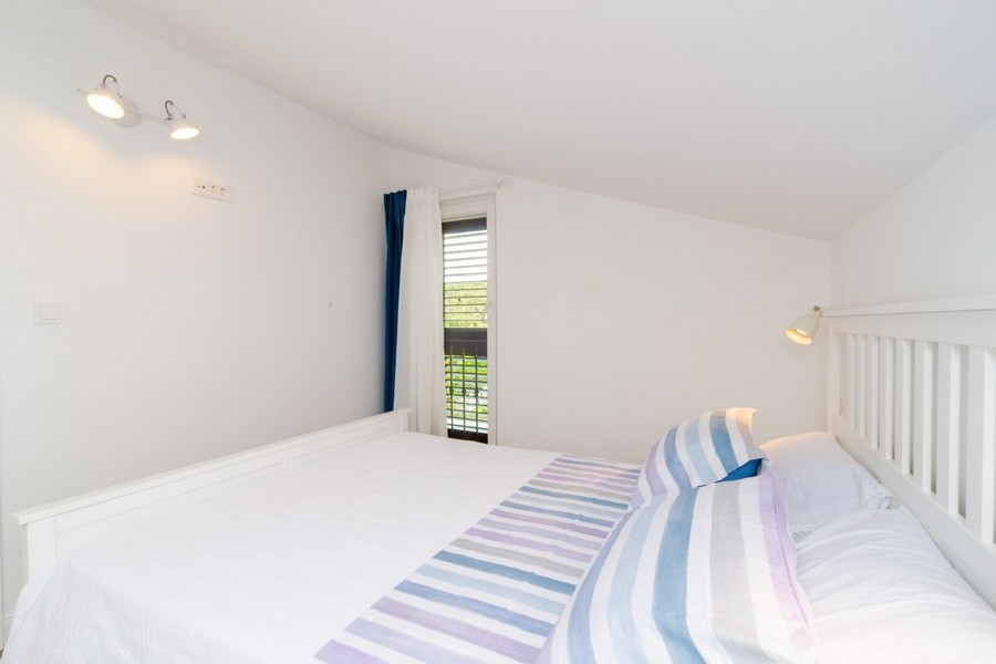 Bedroom with balcony access