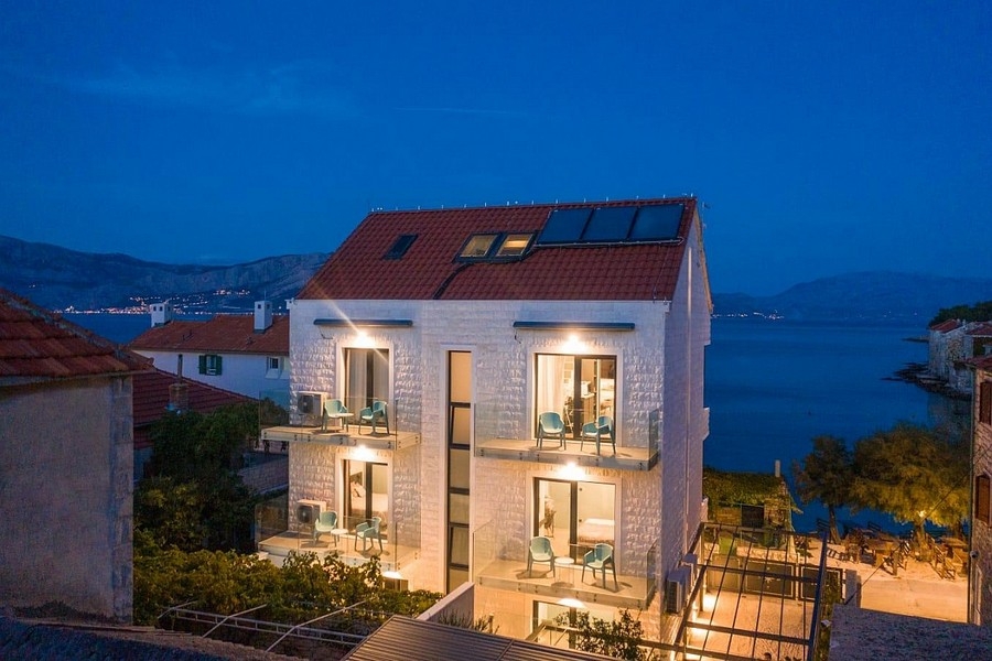 Exterior view with traditional stone facade