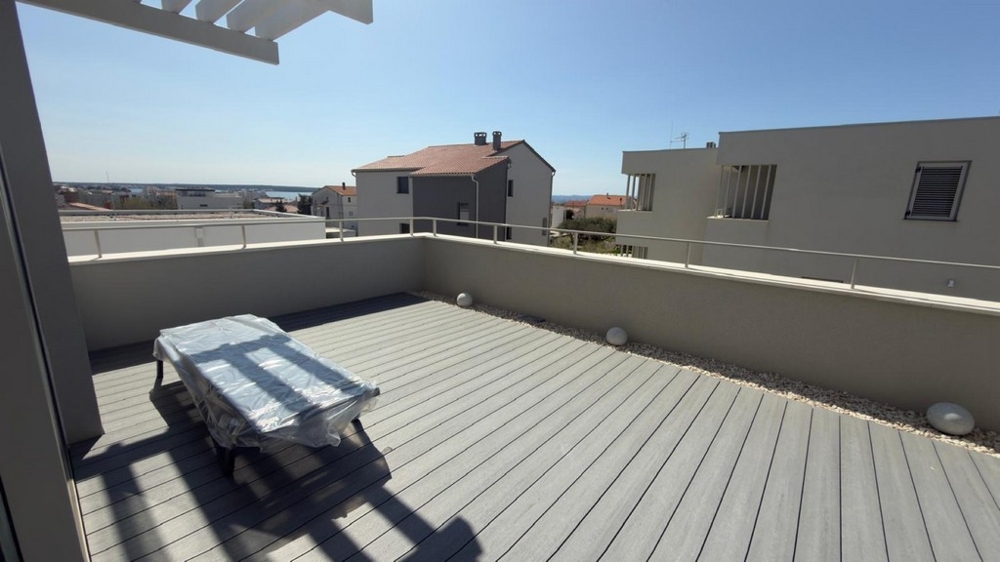 Terrace with access to the living area and pool