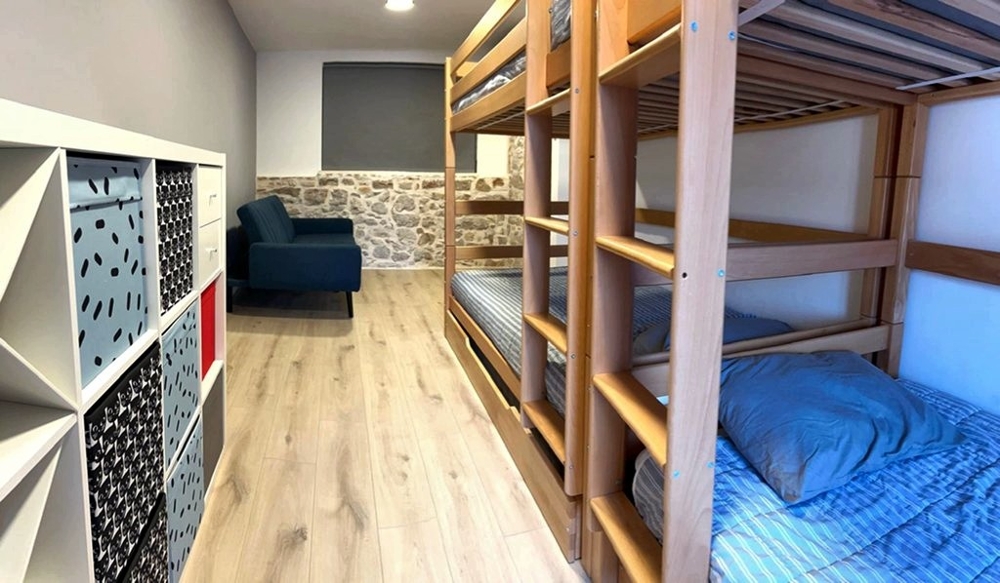 Bedroom with bunk bed and storage space