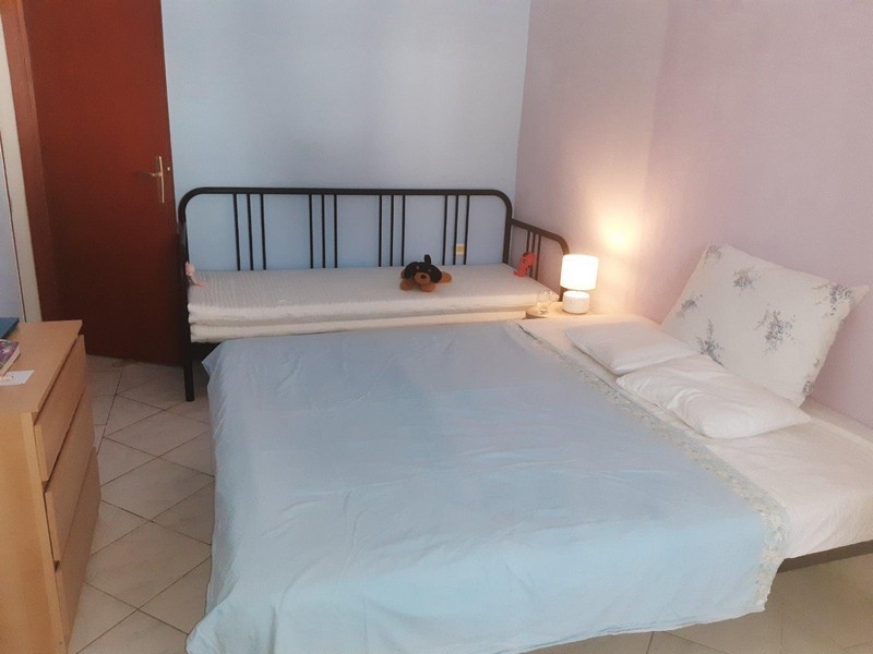 Bedroom with double bed and additional single bed