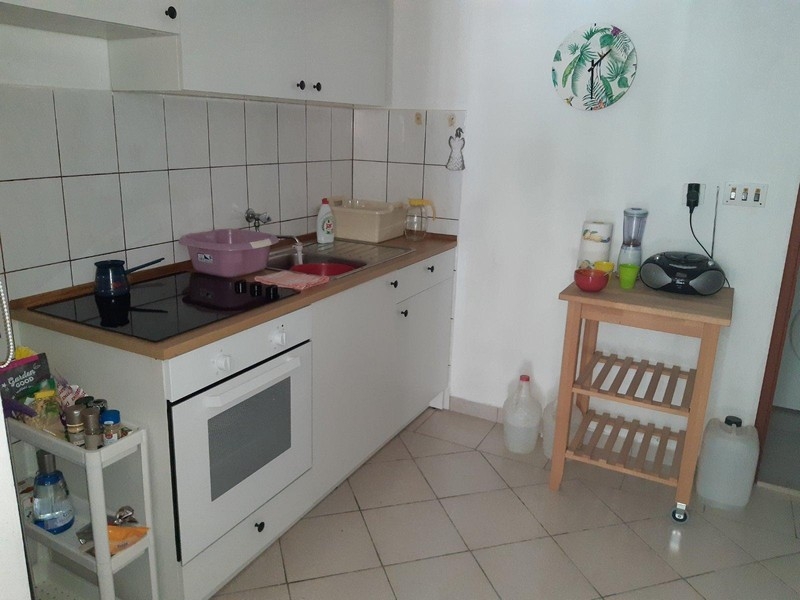 Kitchen with built-in appliances and functional equipment