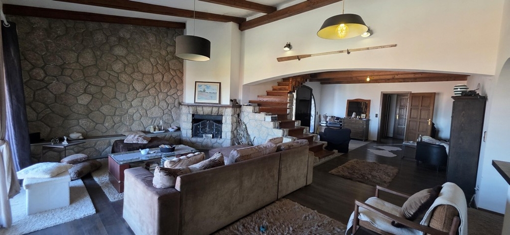 Spacious terrace with seating area and Mediterranean design