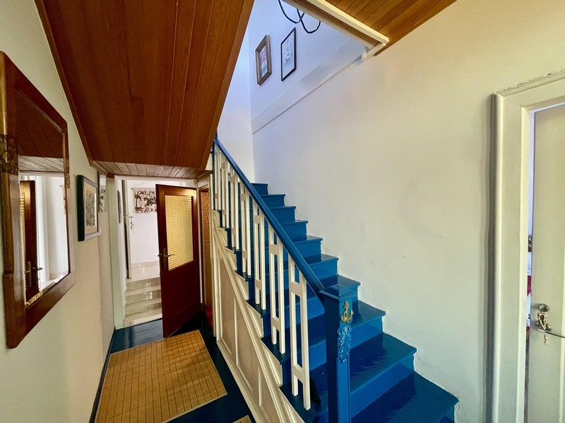 Hallway with staircase and entrance area