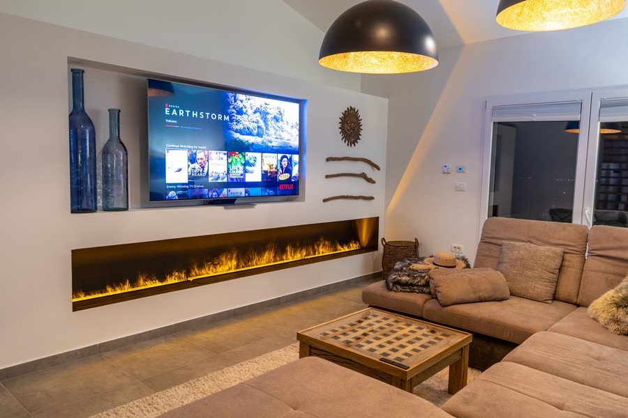 Living area with fireplace and modern furnishings