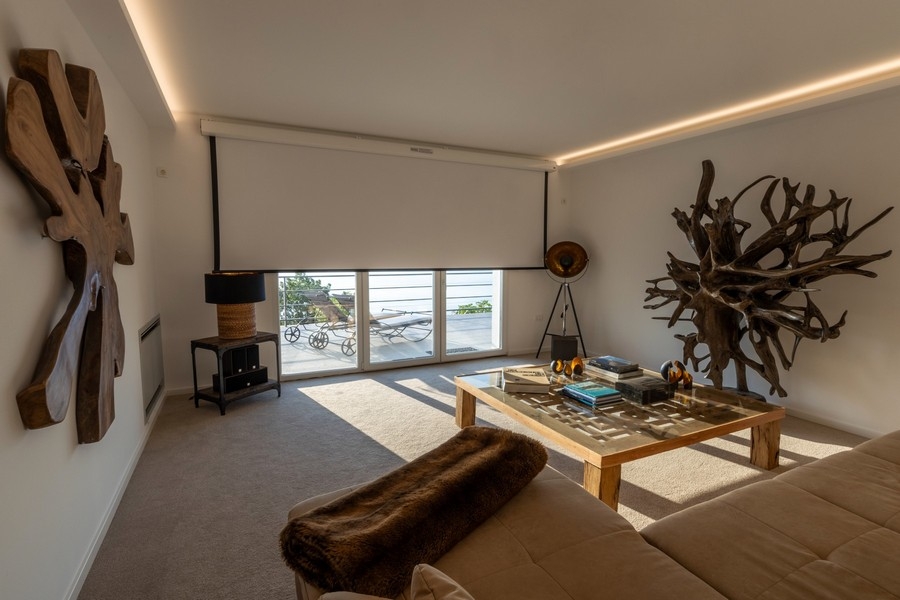 Living room with large windows and sea views