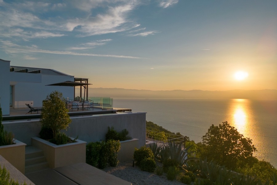 Sun terrace with lounge and sea views