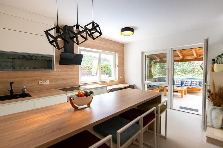 Bright kitchen area with direct access to the covered terrace