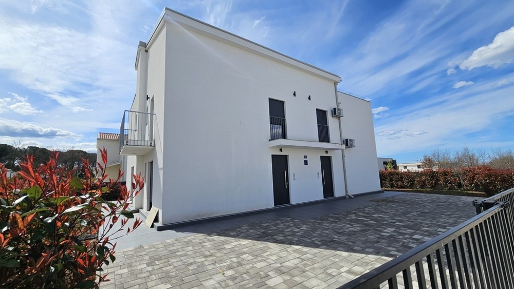 Back of the house H3895, which is for sale near Porec in Istria.