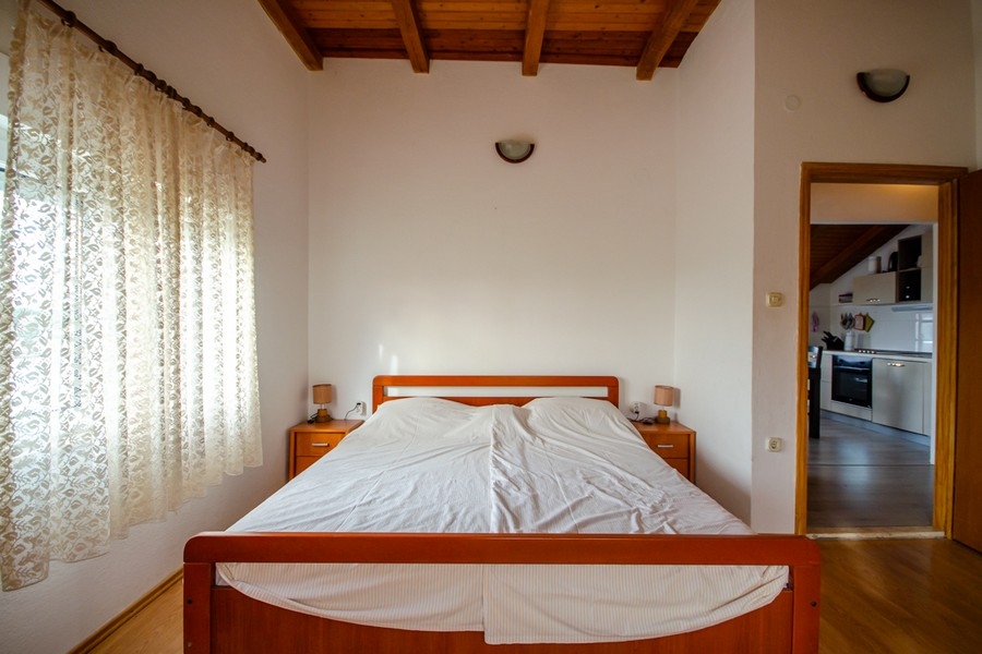 Another bedroom with double bed and access to the living area