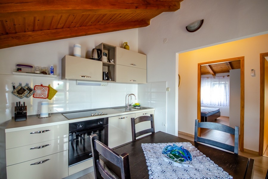 Modern kitchen with built-in appliances and work surface