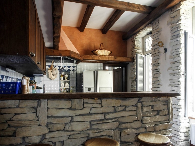 Kitchen with natural stone elements and counter