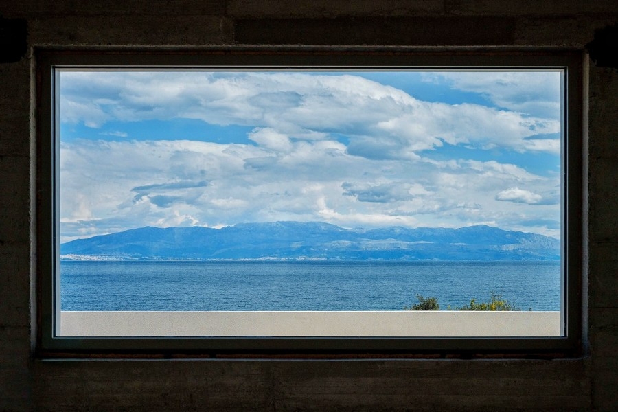 Panoramic window with sea and coast views