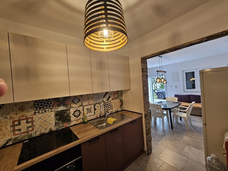 Kitchen with passage to the living area