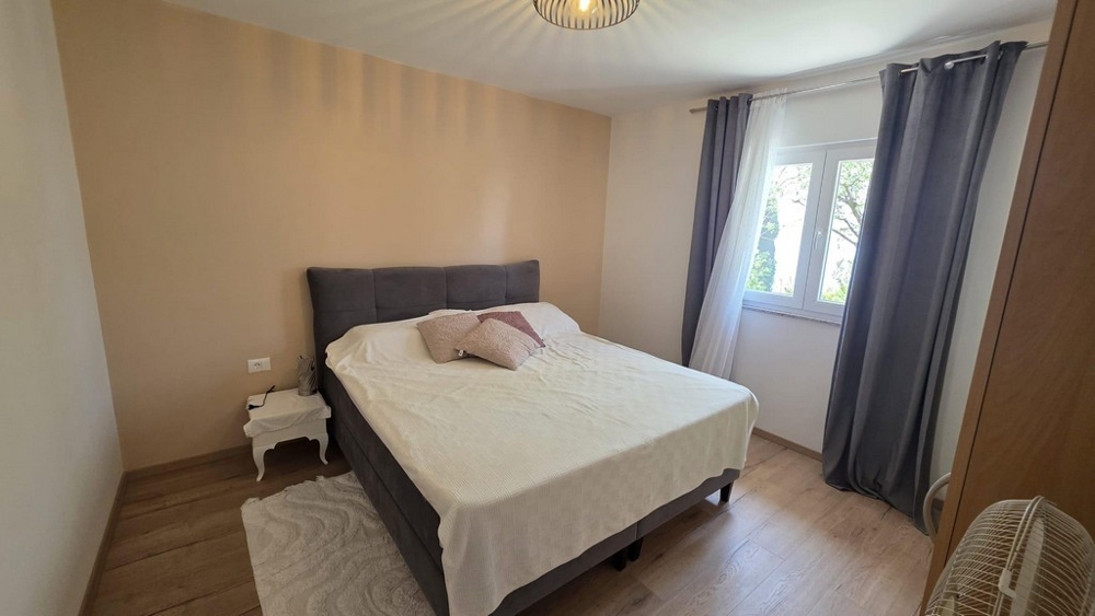 Bedroom with double bed and window