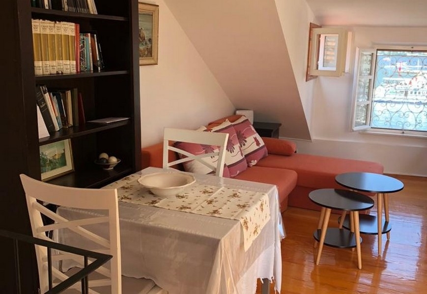Attic room with seating area