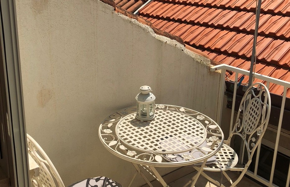 Roof terrace with seating and views of roofs