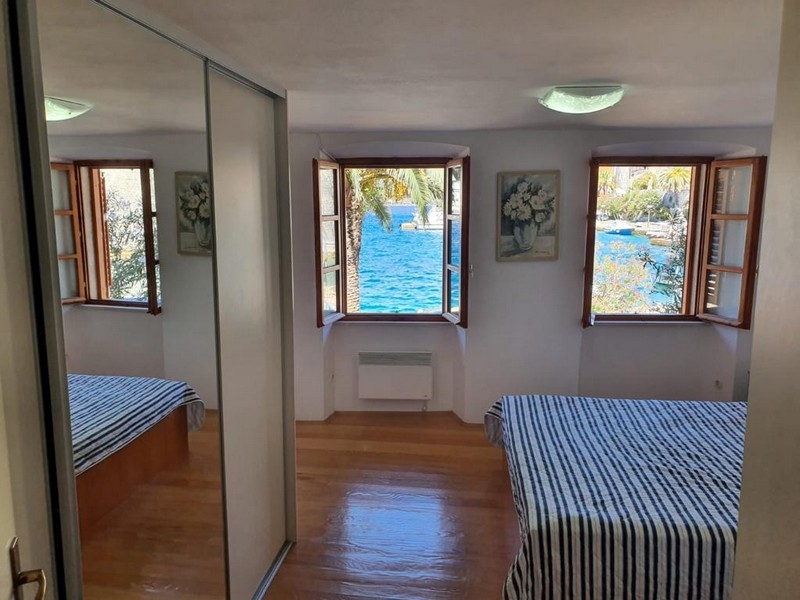 Bedroom with sea views and built-in wardrobe