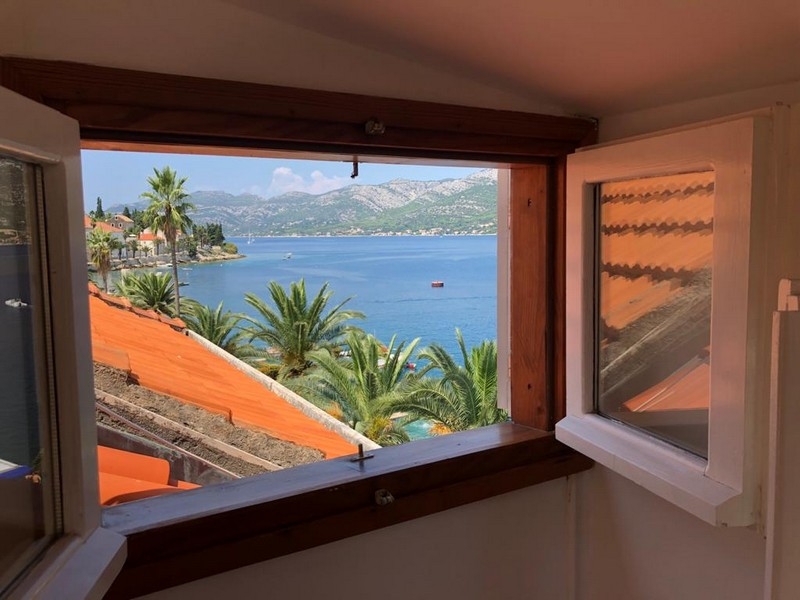 Sea view from window with coastal panorama