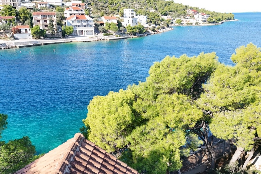 Sea view over a quiet bay with houses on the coast