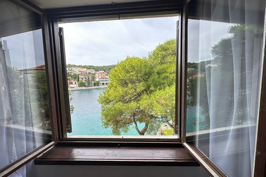 View from the window of the sea and the opposite coast