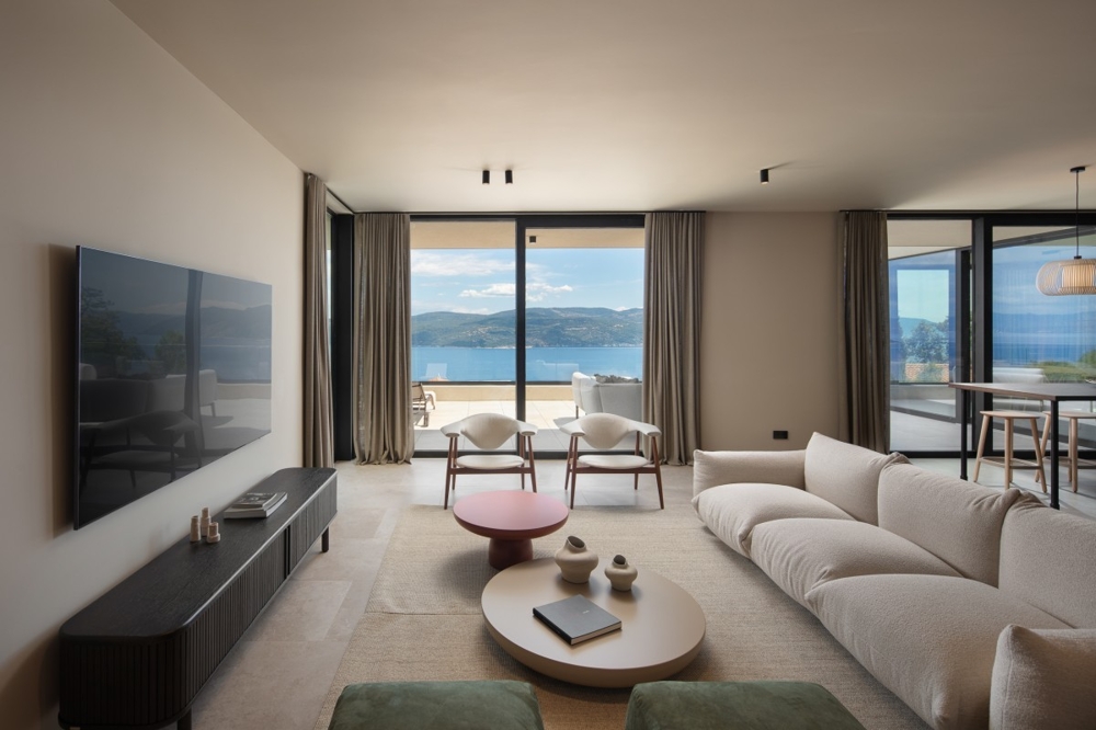 Living room with large windows and sea views