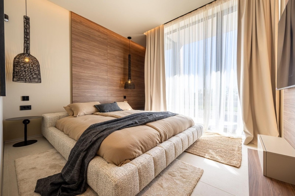Modern bedroom with wooden paneling