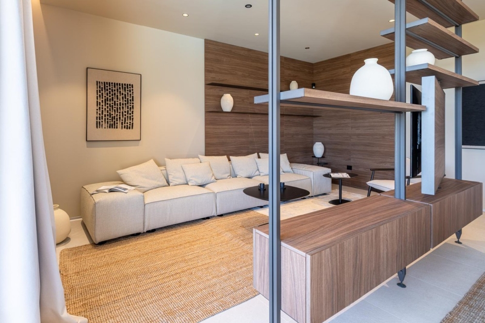 Open living area with designer furniture and wooden details