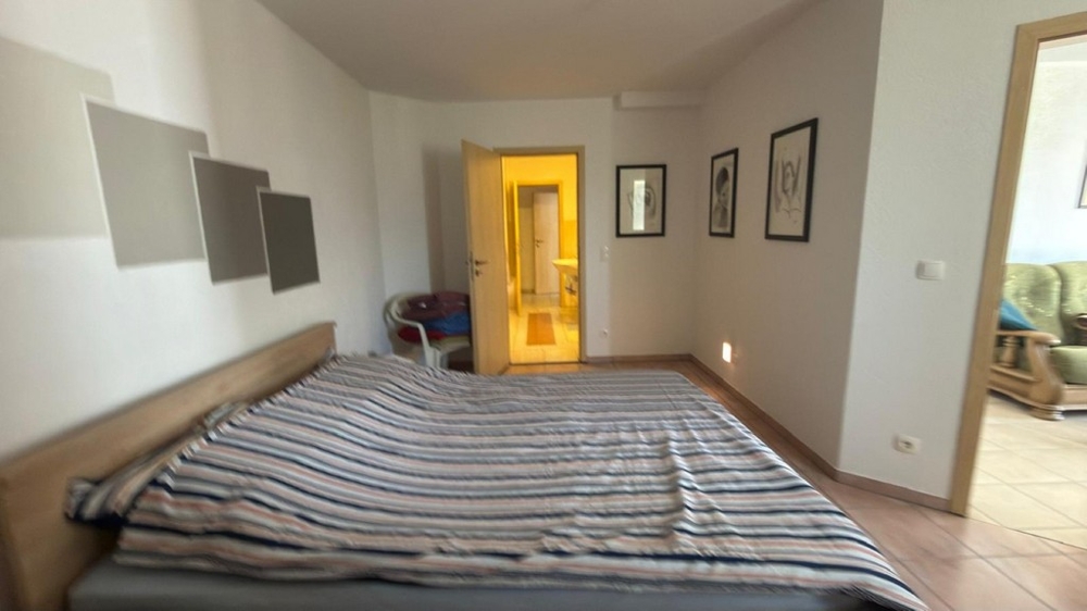 Bedroom with a view towards the bathroom