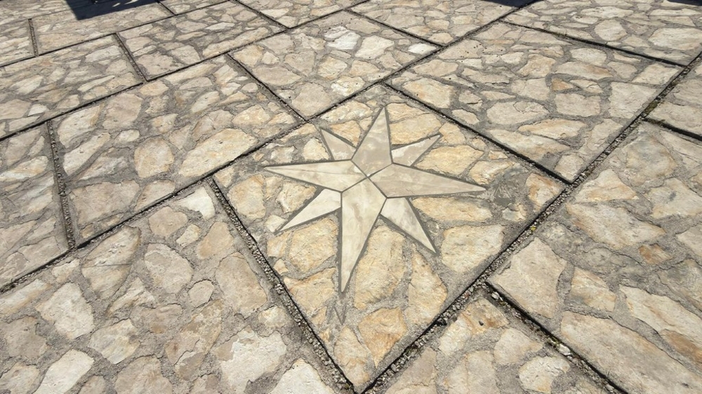 Terrace with natural stone floor and decorative pattern