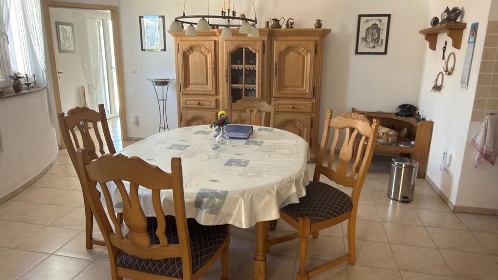 Dining room with wooden furniture and open space design