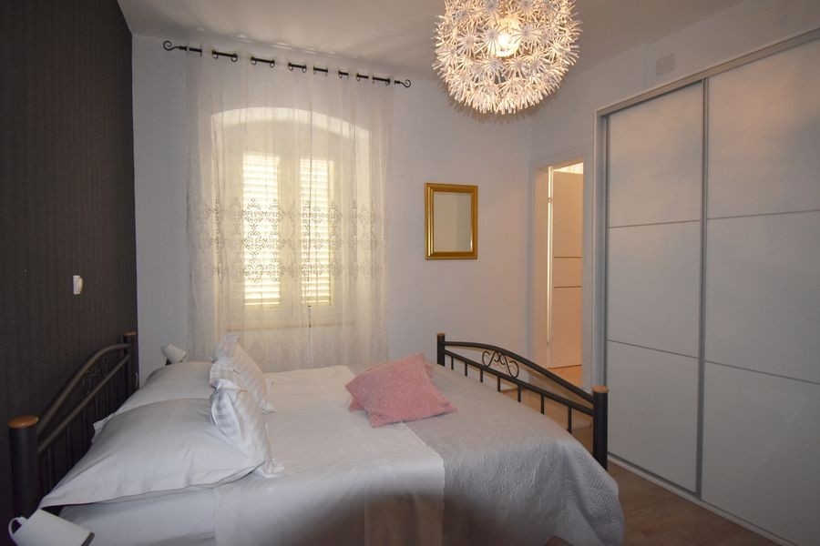 Bedroom with built-in wardrobe