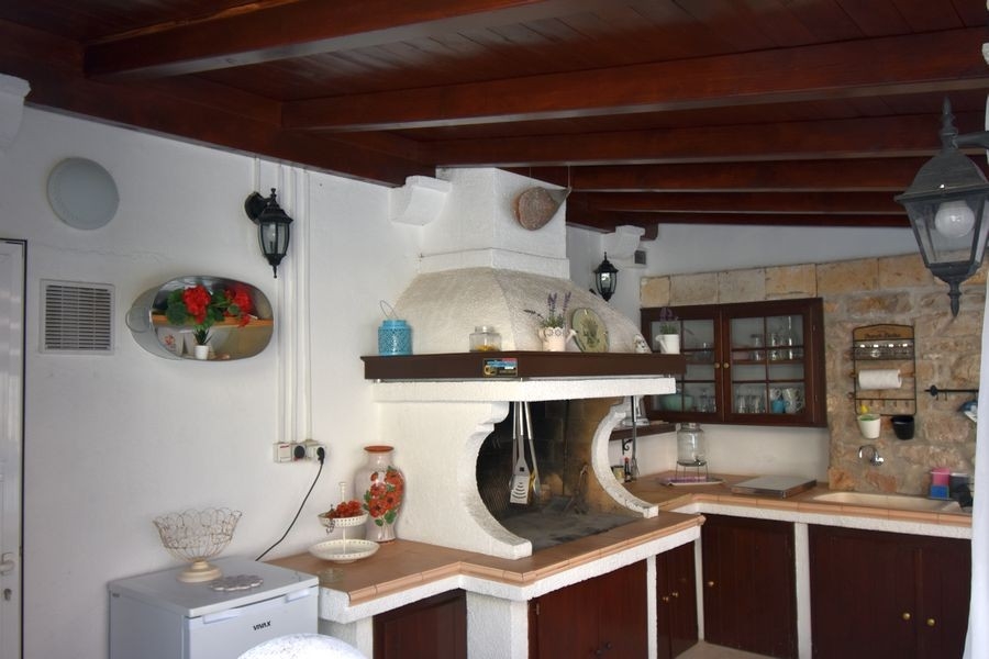 Outdoor kitchen with barbecue area