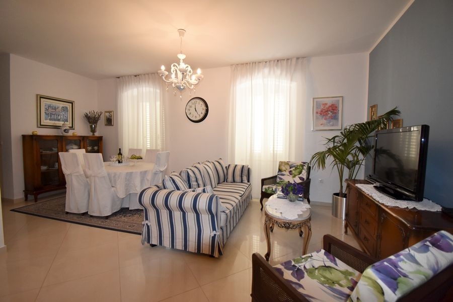 Living room with sofa and classic furnishings