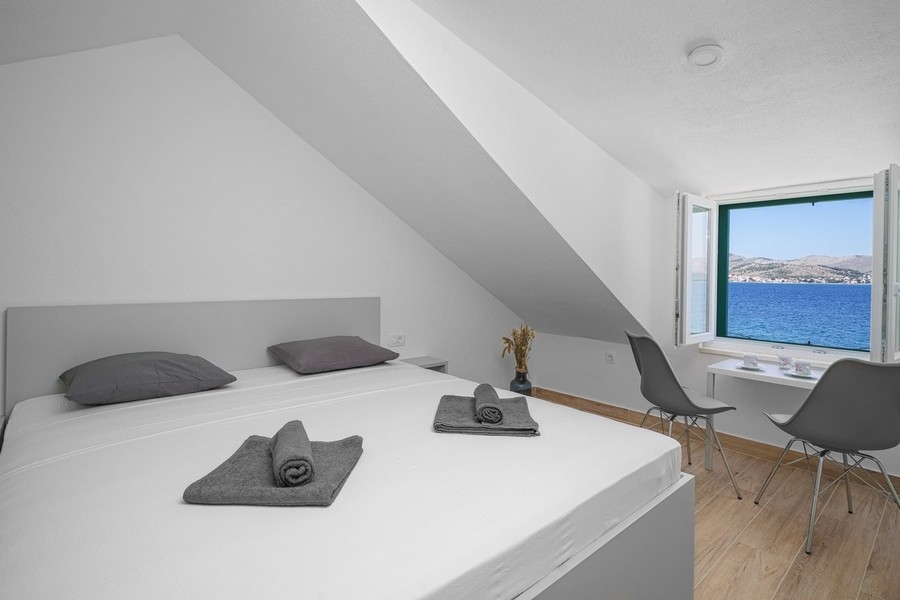 Sea view bedroom with window